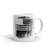 coffee mug with black and white American flag image smeared in a fingerprint